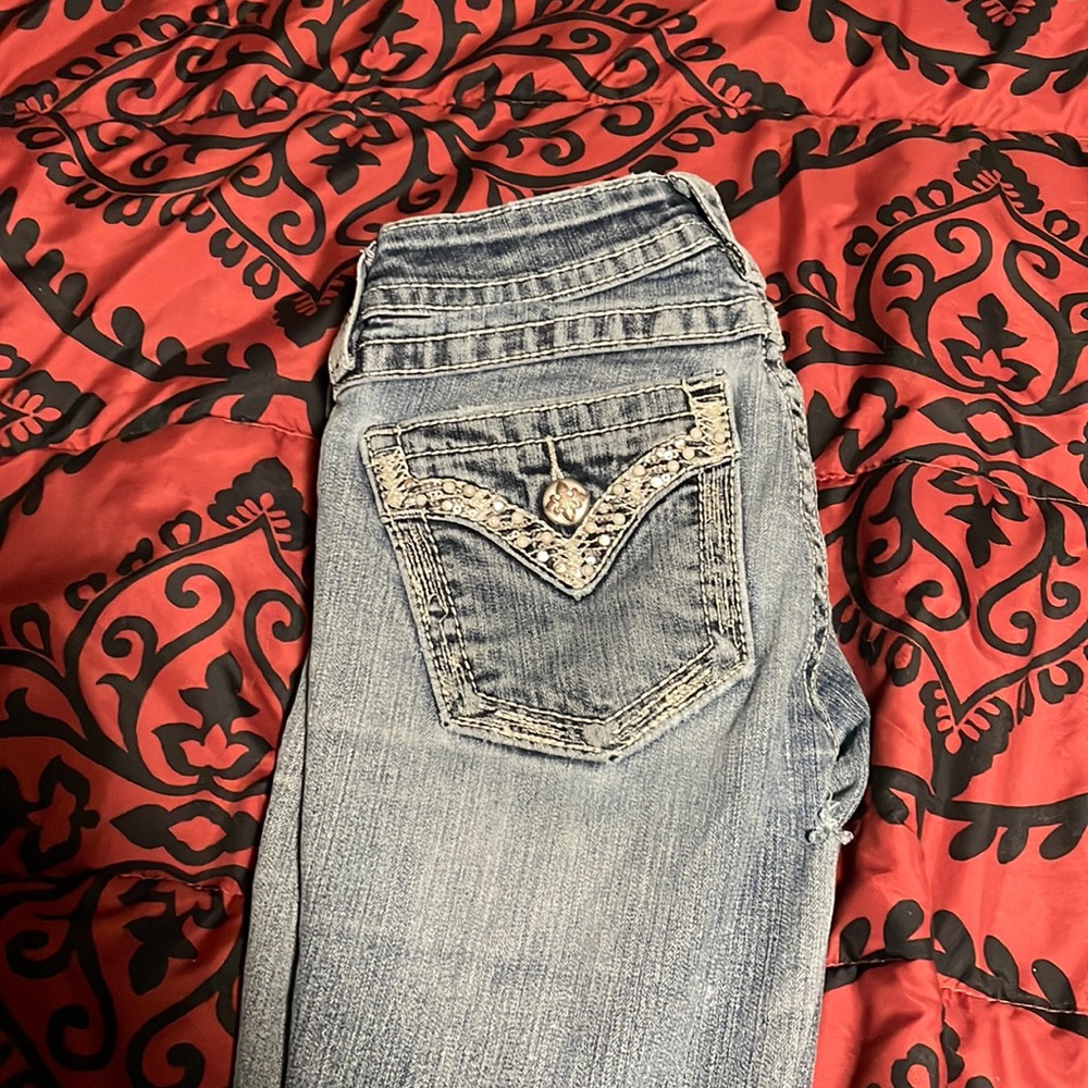 Size 26 bootcut miss me jeans.